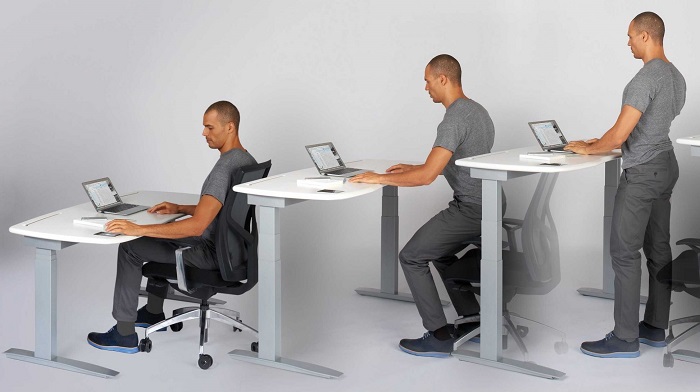 bureau assis debout differentes hauteurs travail